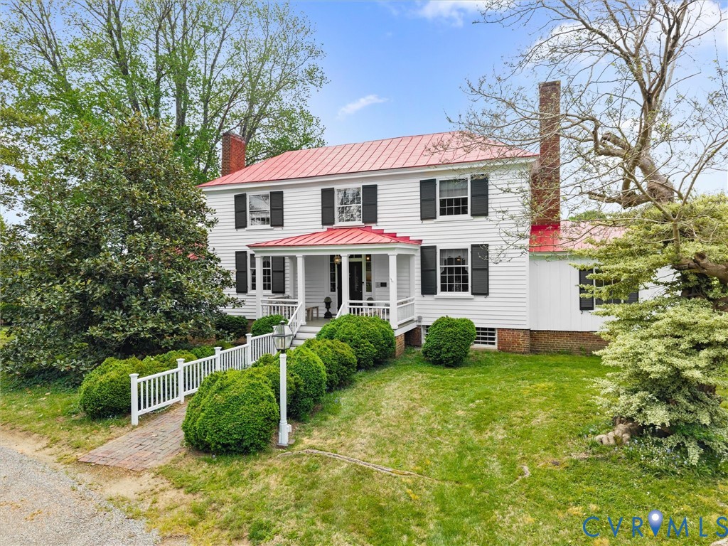 2625 Old Tavern Road Powhatan, VA 23139 - Photo 2 of 100 a view of a house with backyard and sitting area