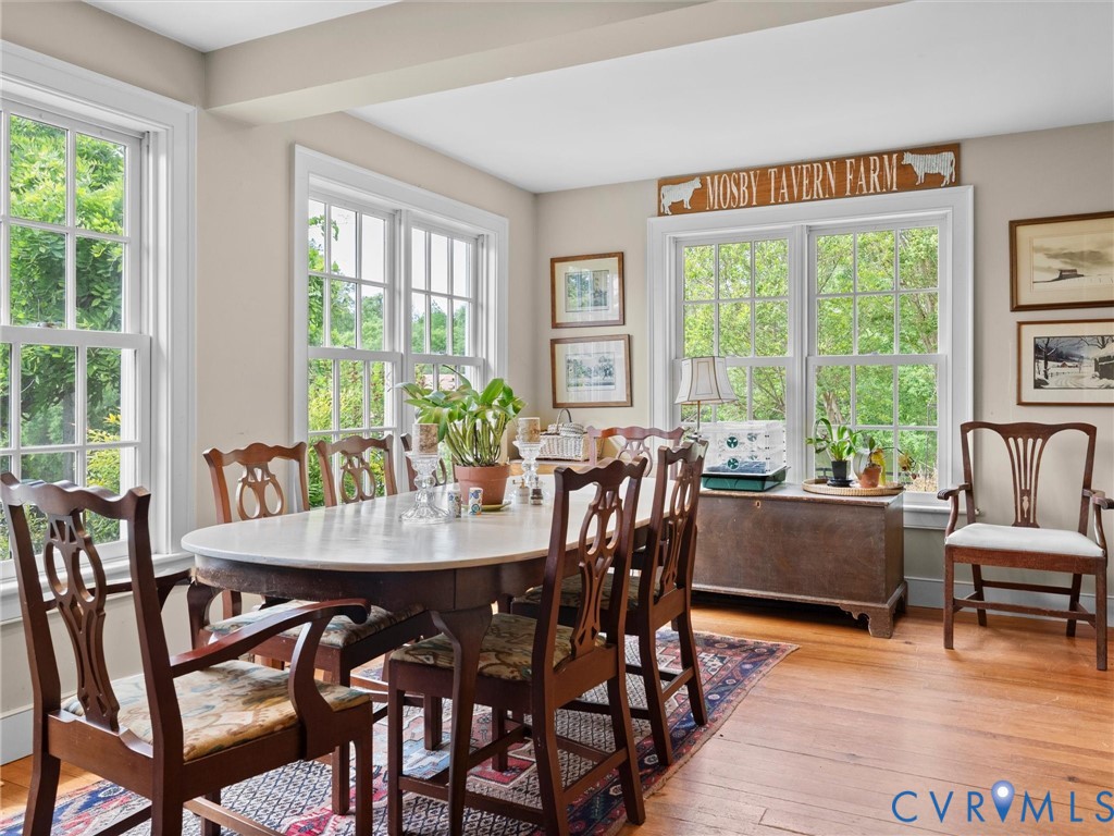 2625 Old Tavern Road Powhatan, VA 23139 - Photo 34 of 100 a view of a dining room with furniture and windows