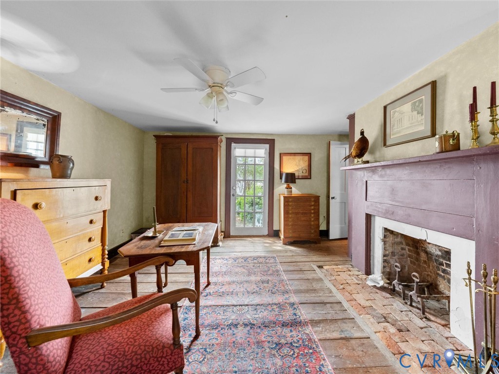 2625 Old Tavern Road Powhatan, VA 23139 - Photo 43 of 100 a view of a livingroom with furniture and a fireplace