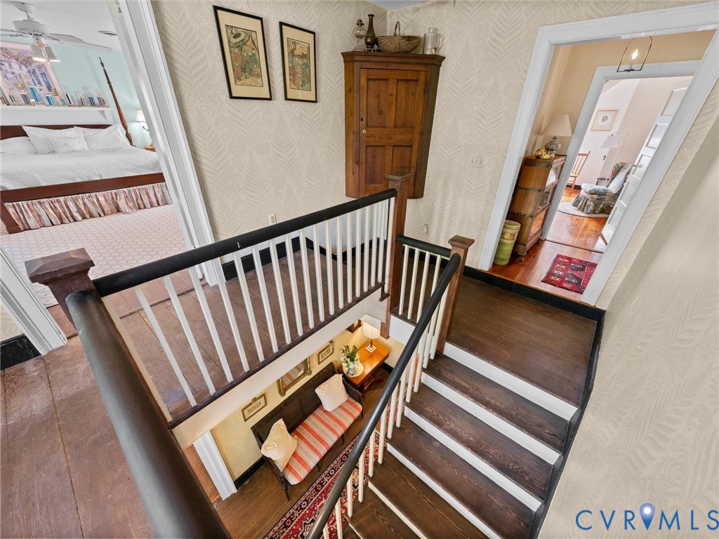 2625 Old Tavern Road Powhatan, VA 23139 - Photo 47 of 100 a view of a hallway with wooden floor and stairs