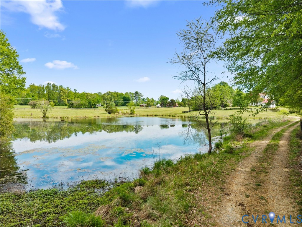 2625 Old Tavern Road Powhatan, VA 23139 - Photo 80 of 100 a view of a lake with houses in the background