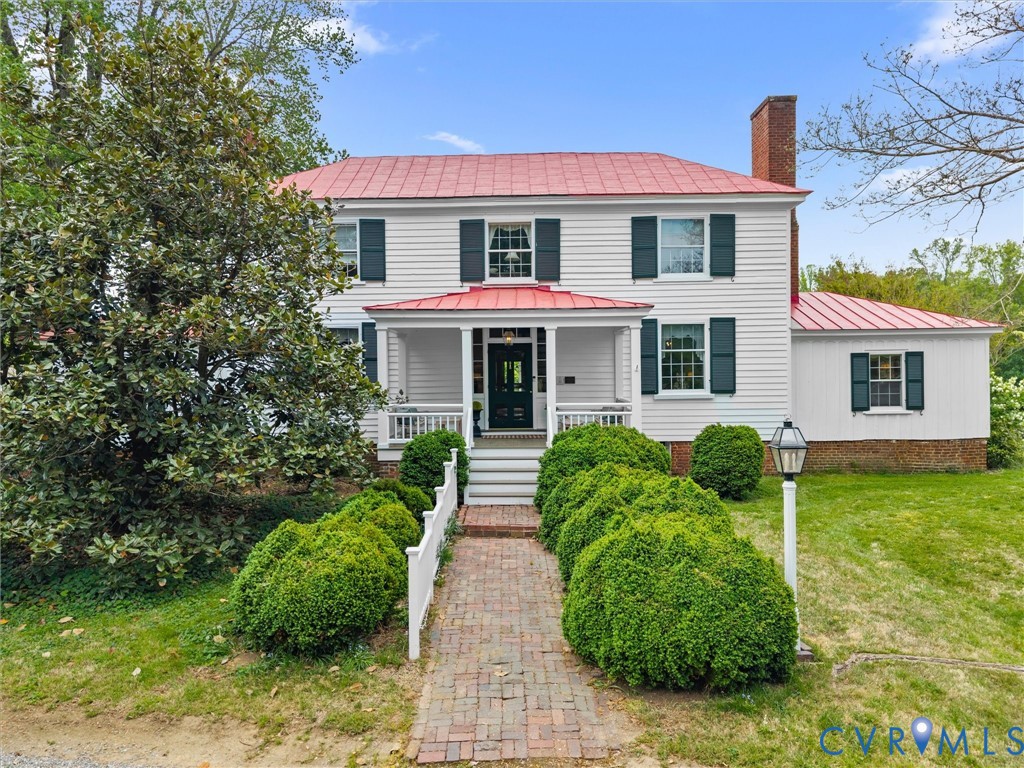 2625 Old Tavern Road Powhatan, VA 23139 - Photo 90 of 100 a front view of a house with garden