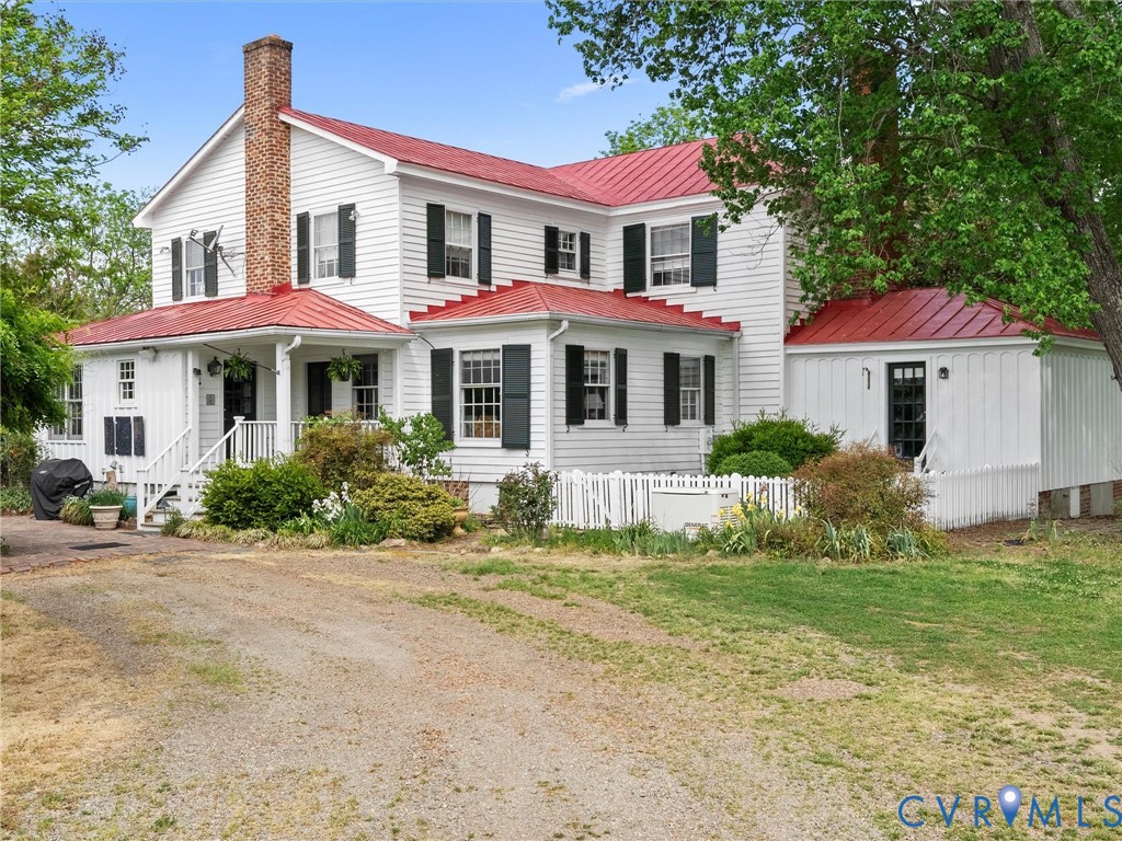 2625 Old Tavern Road Powhatan, VA 23139 - Photo 91 of 100 a front view of a house with a yard