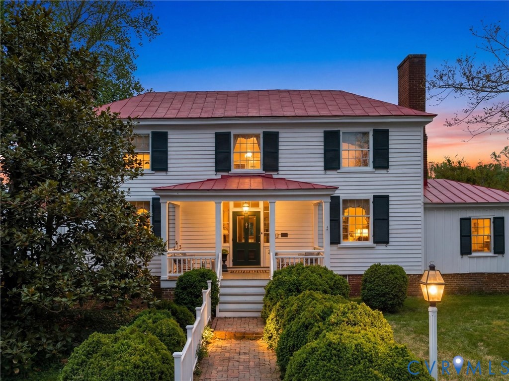 2625 Old Tavern Road Powhatan, VA 23139 - Photo 100 of 100 a front view of a house with garden