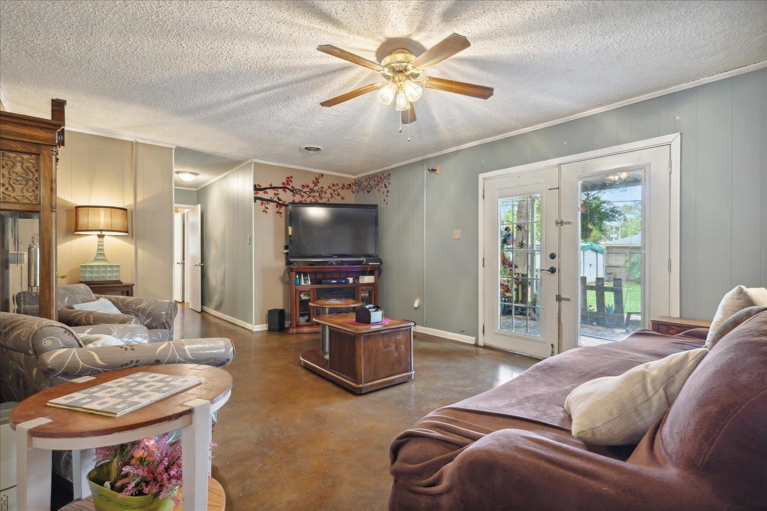 4608 Boyce Road Memphis, TN 38117 - Photo 12 of 30 a living room with furniture and a flat screen tv