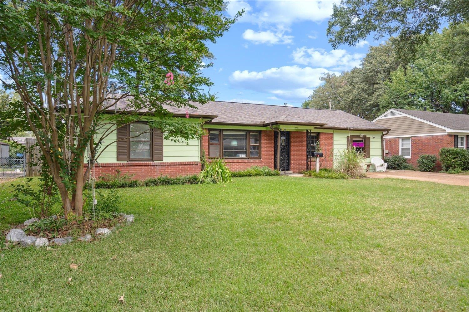 4608 Boyce Road Memphis, TN 38117 - Photo 2 of 30 a front view of a house with a garden