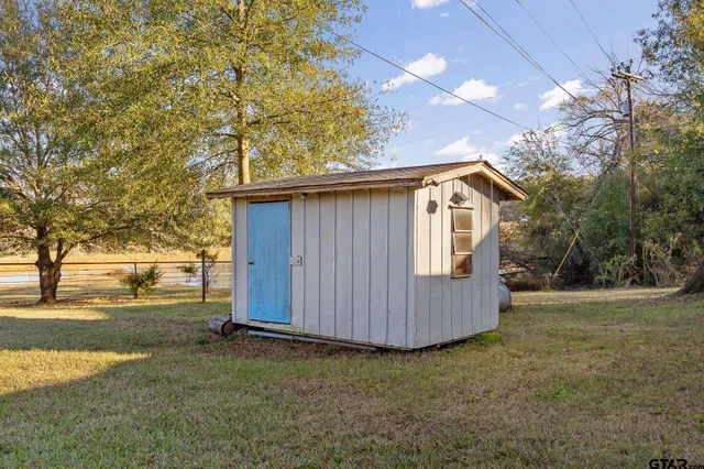 a view of backyard of house