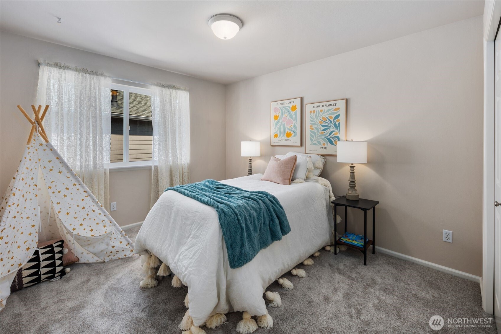 18523 173rd Street Southeast Renton, WA 98058 - Photo 26 of 40 a bedroom with a bed and a window