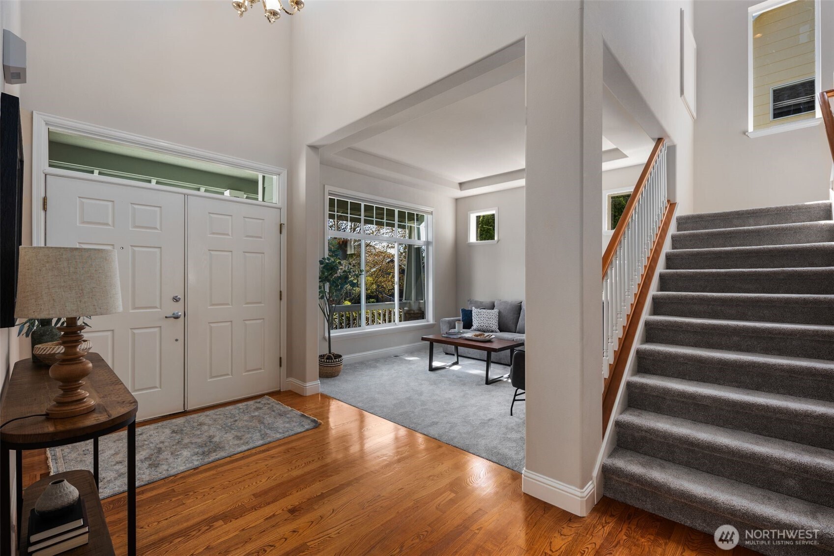 18523 173rd Street Southeast Renton, WA 98058 - Photo 3 of 40 a view of entryway with wooden floor and furniture