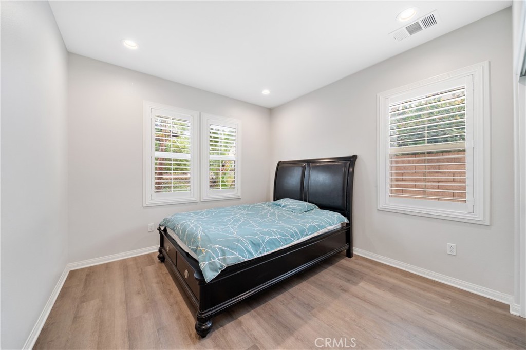323 La Ventana Drive Brea, CA 92823 - Photo 14 of 47 a bedroom with a bed and window