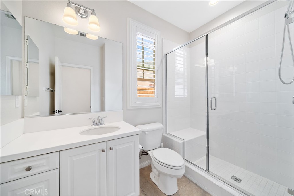 323 La Ventana Drive Brea, CA 92823 - Photo 15 of 47 a bathroom with a sink a toilet and shower