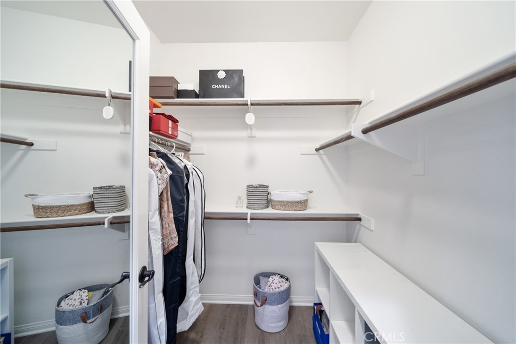 323 La Ventana Drive Brea, CA 92823 - Photo 22 of 47 a view of walk in closet with clothes and shoes
