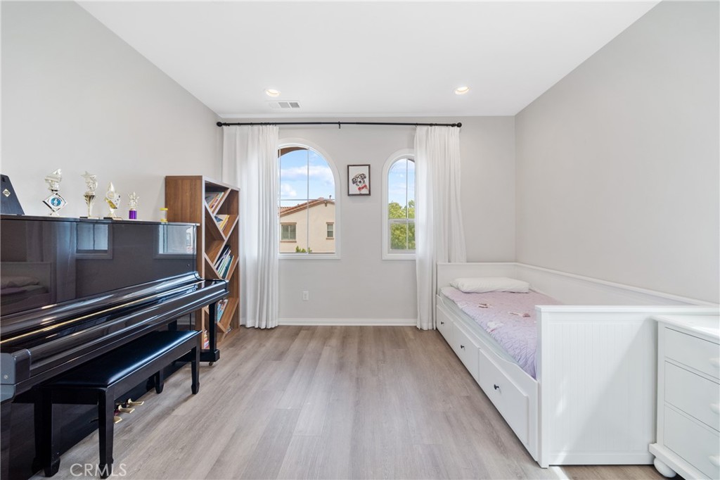 323 La Ventana Drive Brea, CA 92823 - Photo 24 of 47 a bathroom with a sink a mirror and a bathtub
