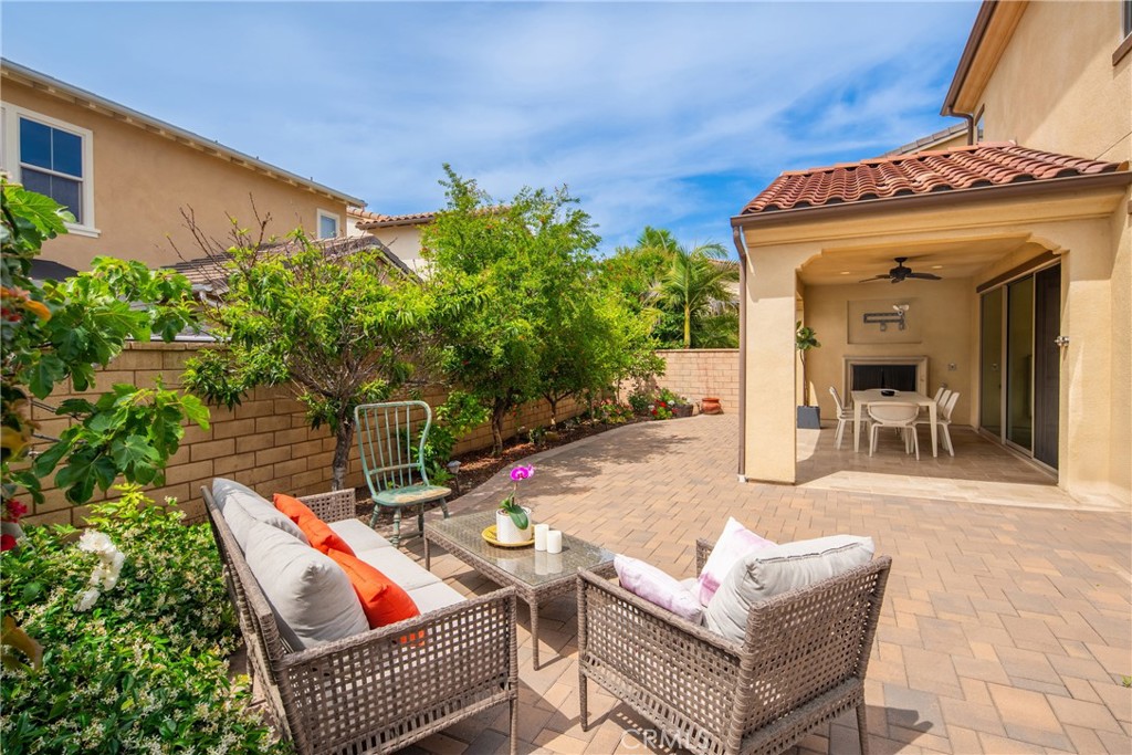 323 La Ventana Drive Brea, CA 92823 - Photo 30 of 47 front view of a house with a chairs and table in the patio