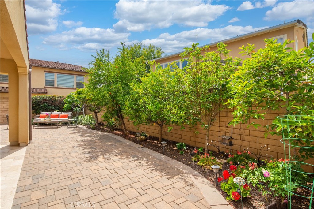 323 La Ventana Drive Brea, CA 92823 - Photo 33 of 47 a view of a pathway that has potted plants