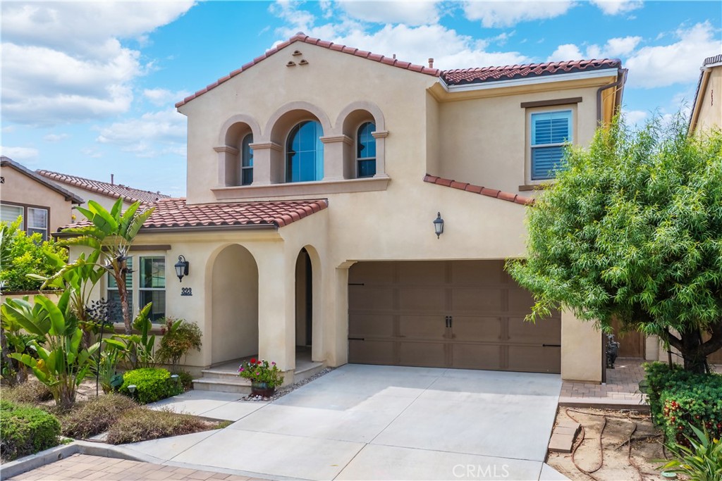 323 La Ventana Drive Brea, CA 92823 - Photo 34 of 47 a front view of a house with garage