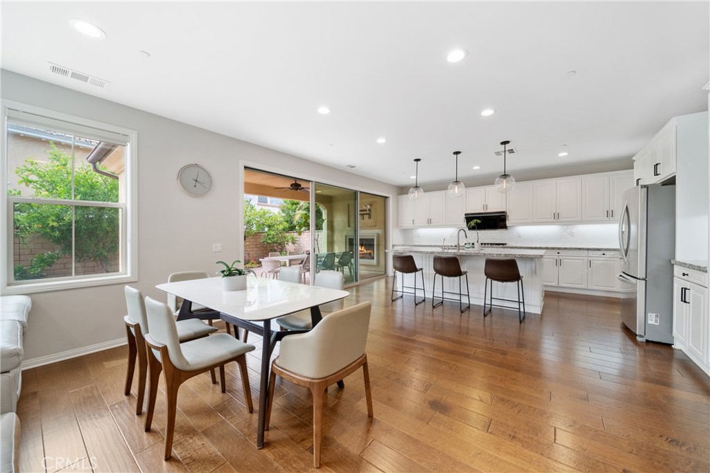 323 La Ventana Drive Brea, CA 92823 - Photo 6 of 47 a view of a dining room with furniture and wooden floor