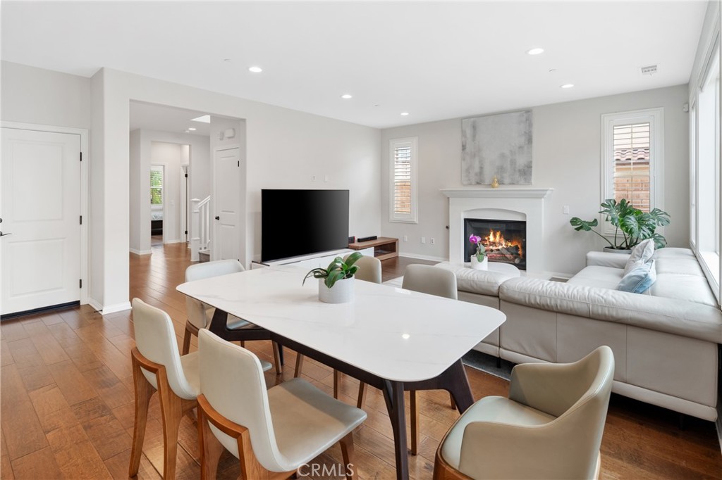 323 La Ventana Drive Brea, CA 92823 - Photo 7 of 47 a living room with furniture a fireplace and a flat screen tv