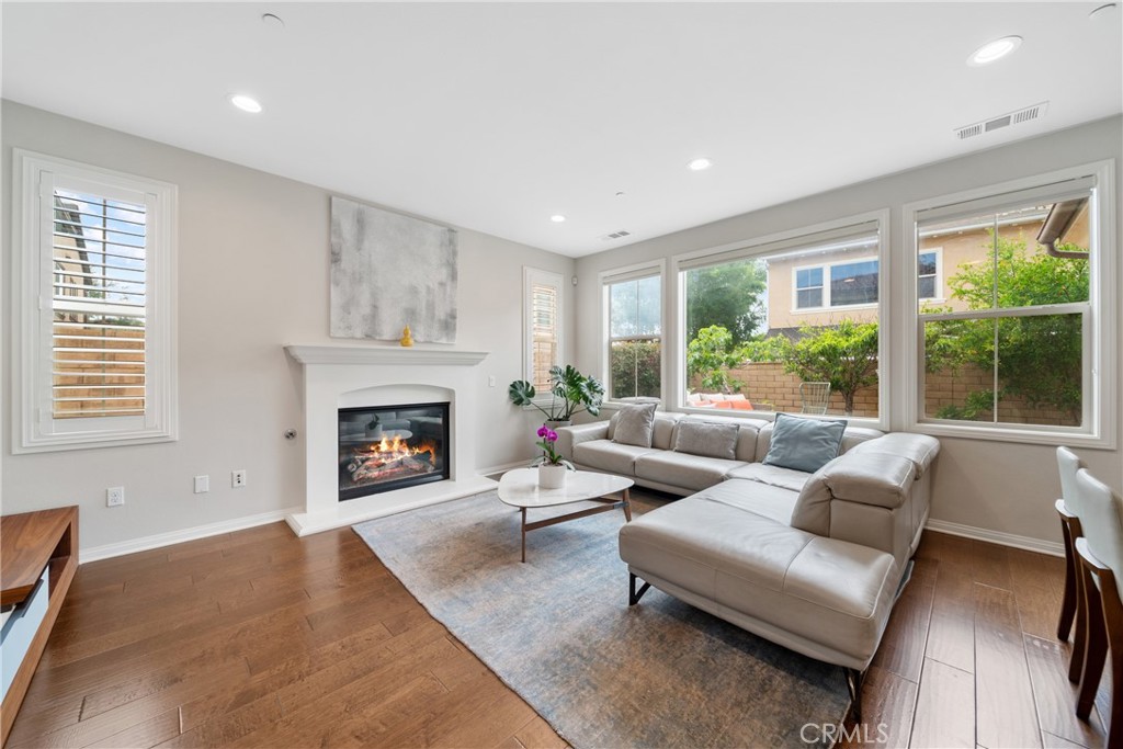 323 La Ventana Drive Brea, CA 92823 - Photo 10 of 47 a living room with furniture and a fireplace