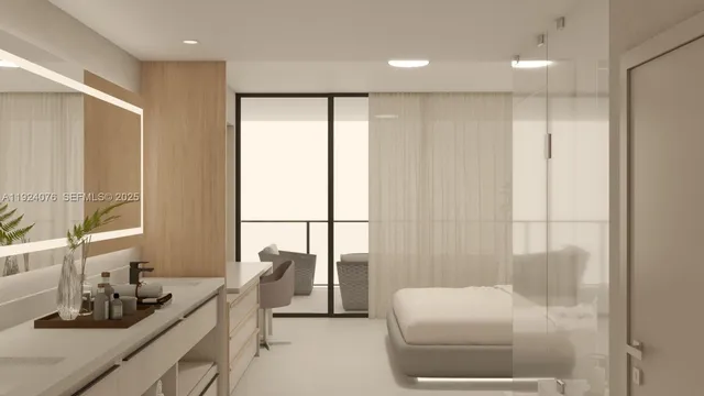 a large white bed in a white room