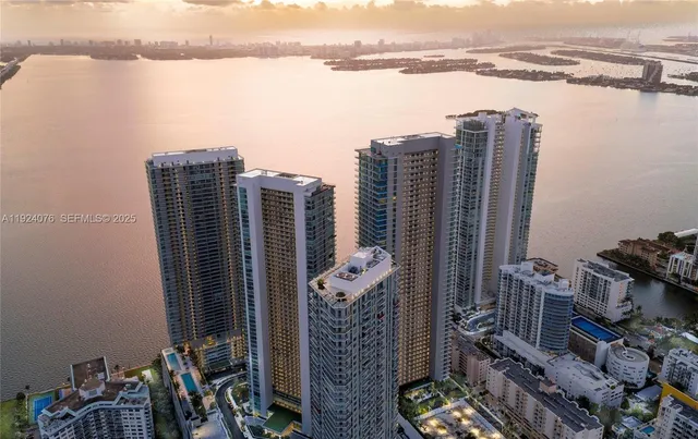 a view of a lake and green space