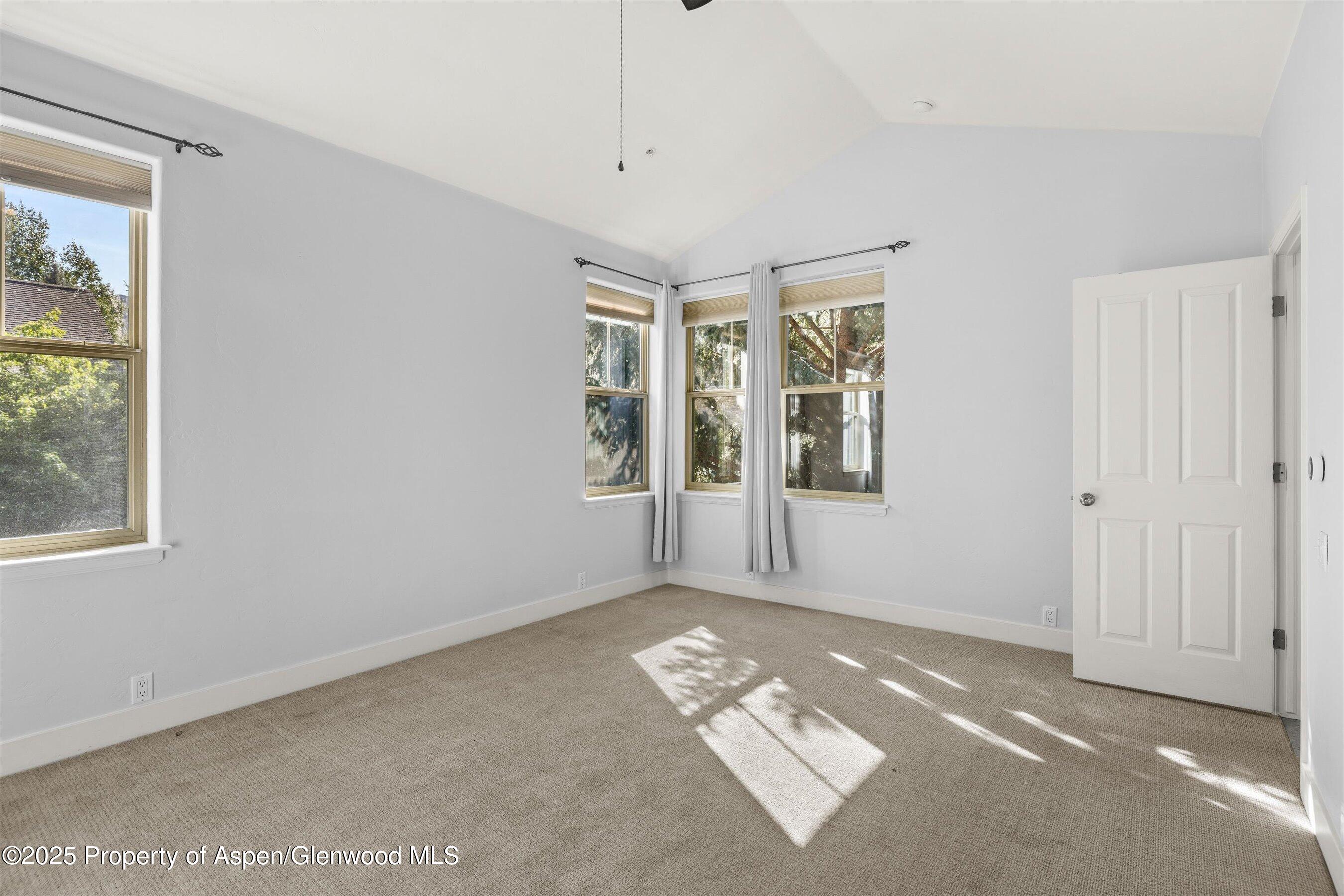 540 Evans Court Basalt, CO 81621 - Photo 13 of 24 an empty room with windows