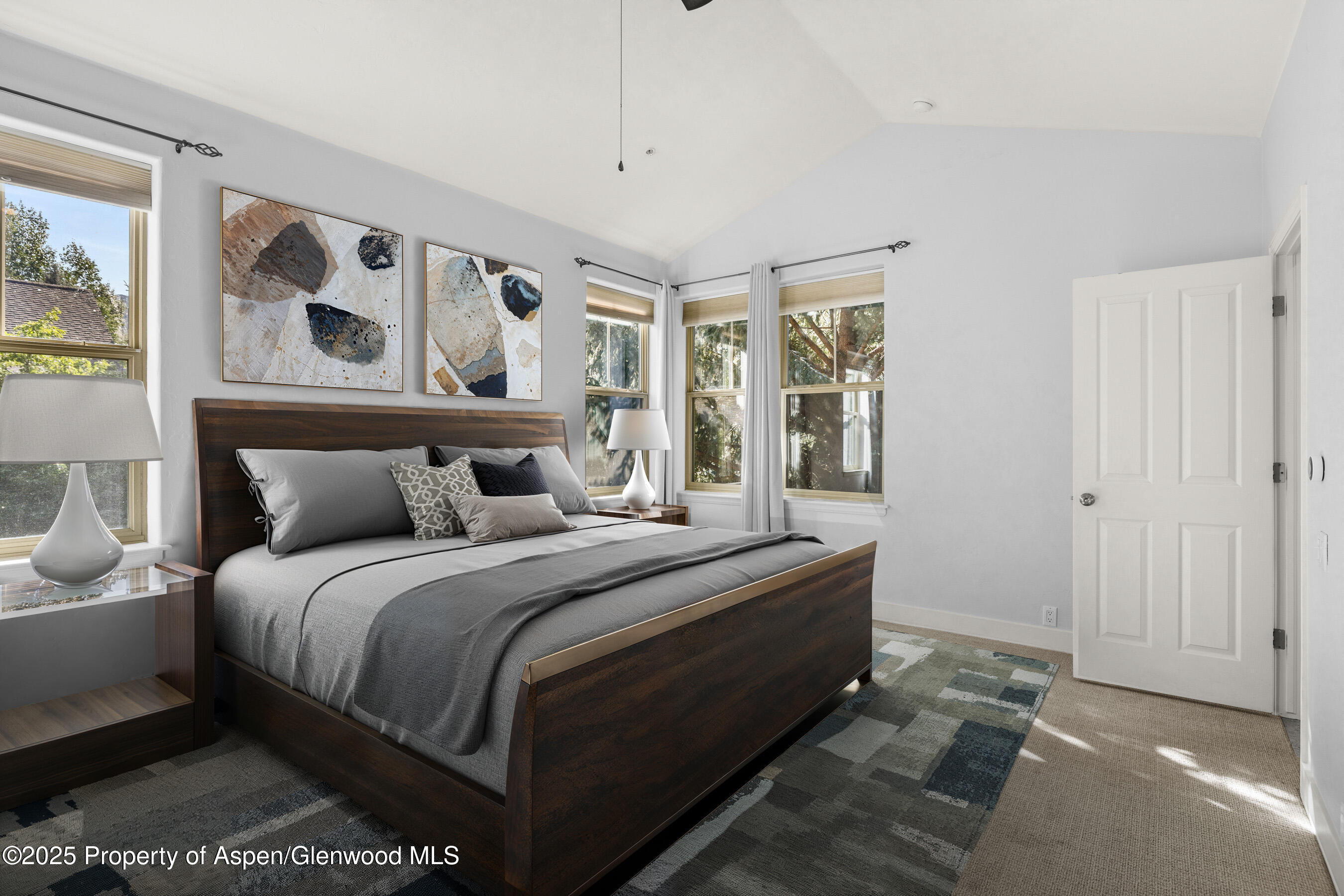 540 Evans Court Basalt, CO 81621 - Photo 14 of 24 a bedroom with a large bed and a window