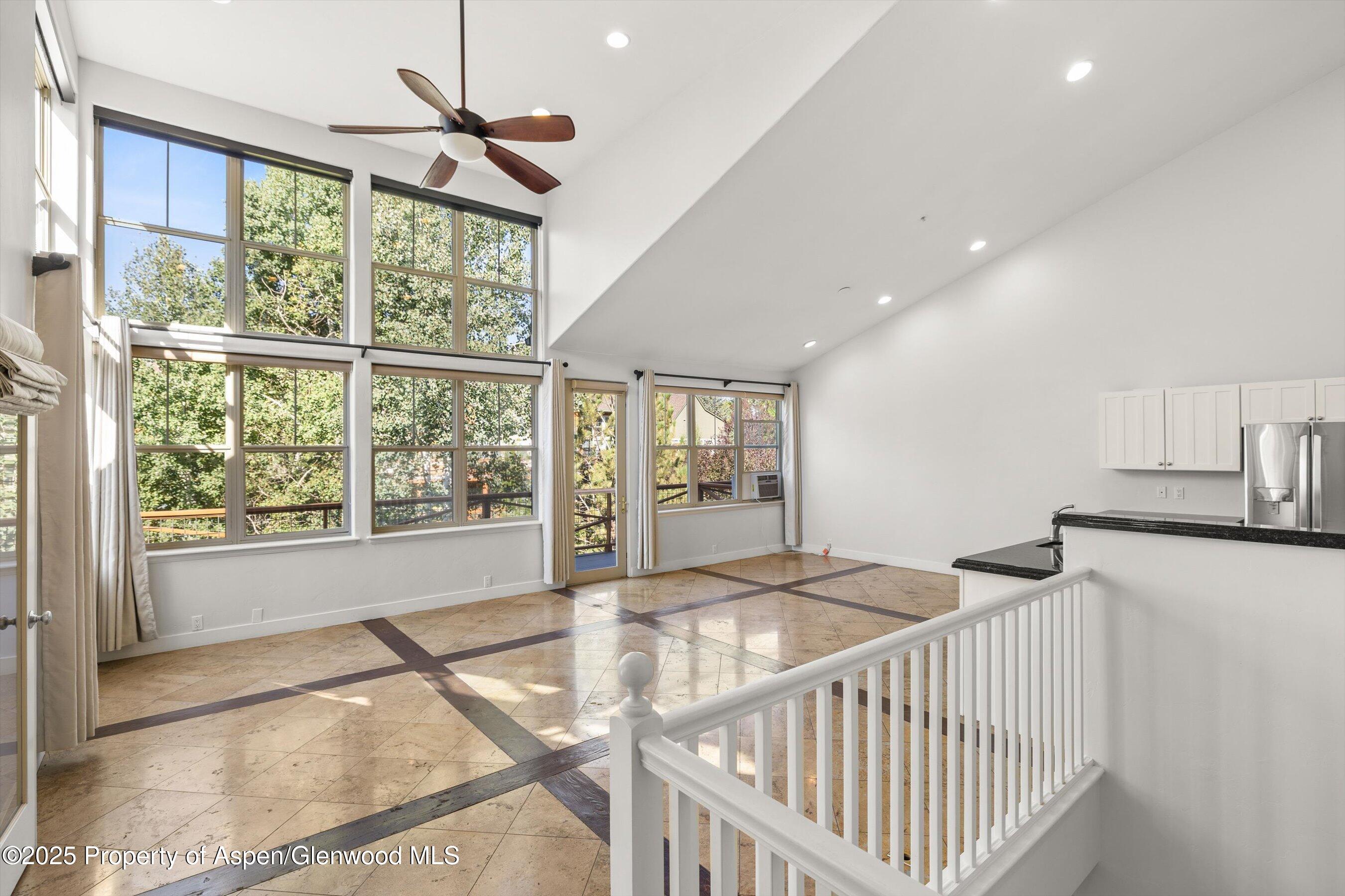 540 Evans Court Basalt, CO 81621 - Photo 4 of 24 a bedroom with furniture and windows