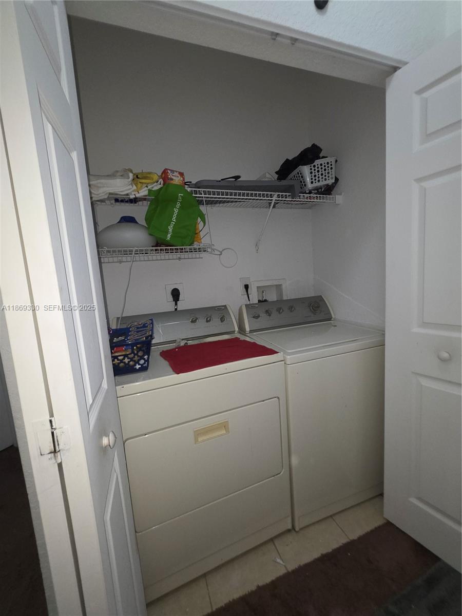 13236 Southwest 128th Street Miami, FL 33186 - Photo 32 of 41 a utility room with dryer and washer