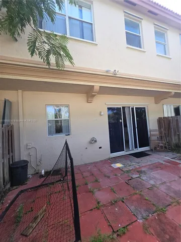 a view of a house with a patio