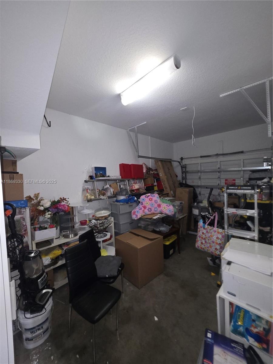 13236 Southwest 128th Street Miami, FL 33186 - Photo 8 of 41 a room with storage and utility