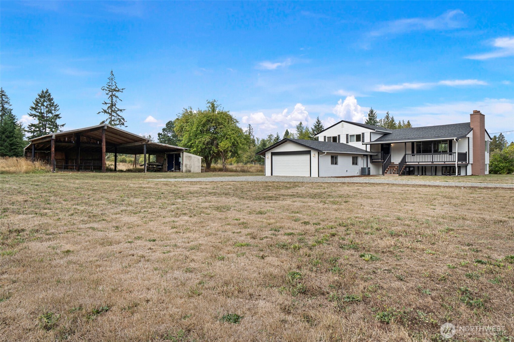7804 280th Street South Roy, WA 98580 - Photo 30 of 33 a front view of a house with a yard