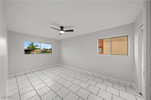 an aerial view of a house with a garden