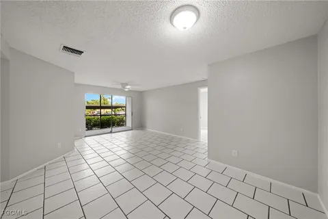 a bathroom with a toilet a sink and a mirror