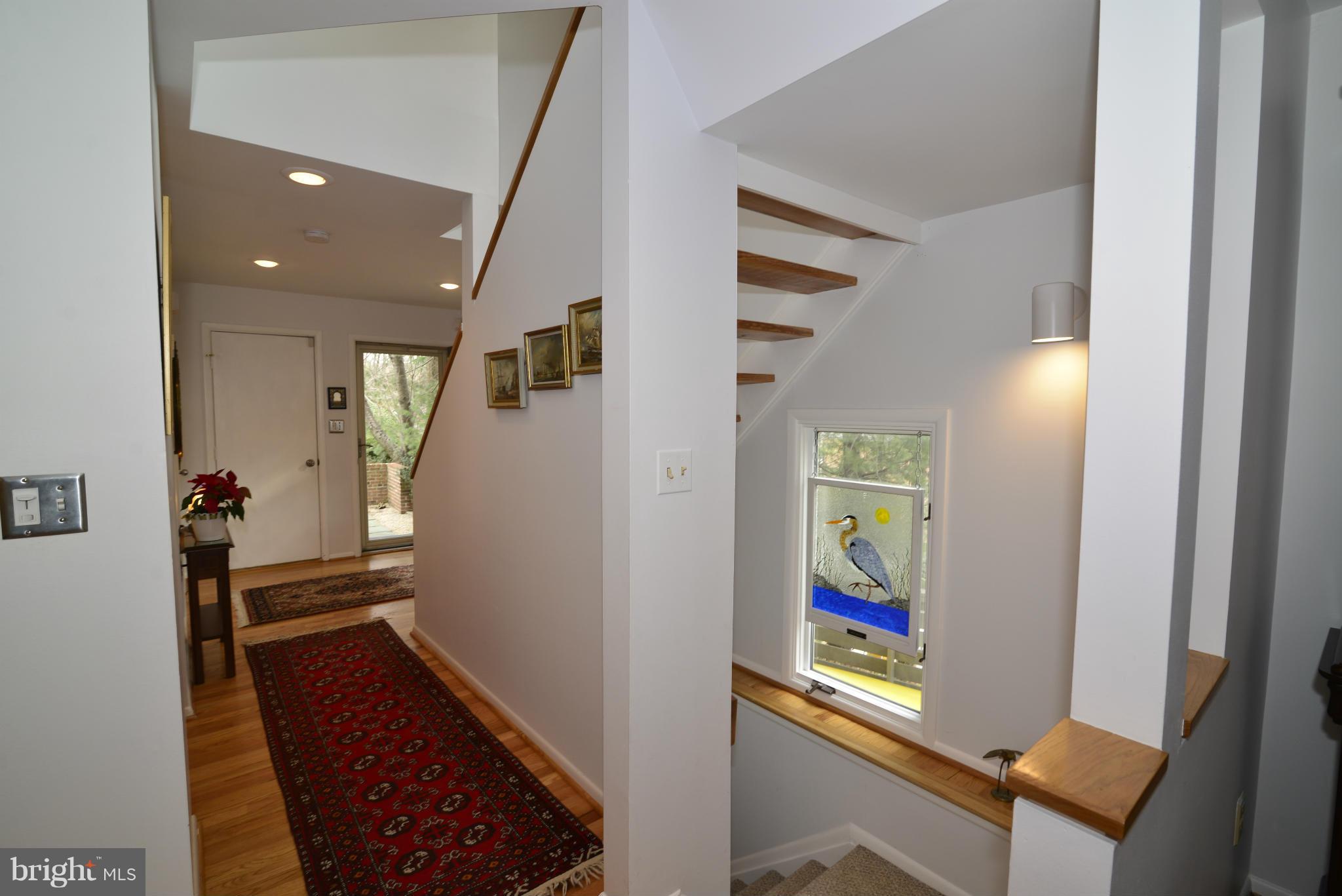 11100 Lakespray Way Reston, VA 20191 - Photo 24 of 29 A view of the main hall leading to the lower level