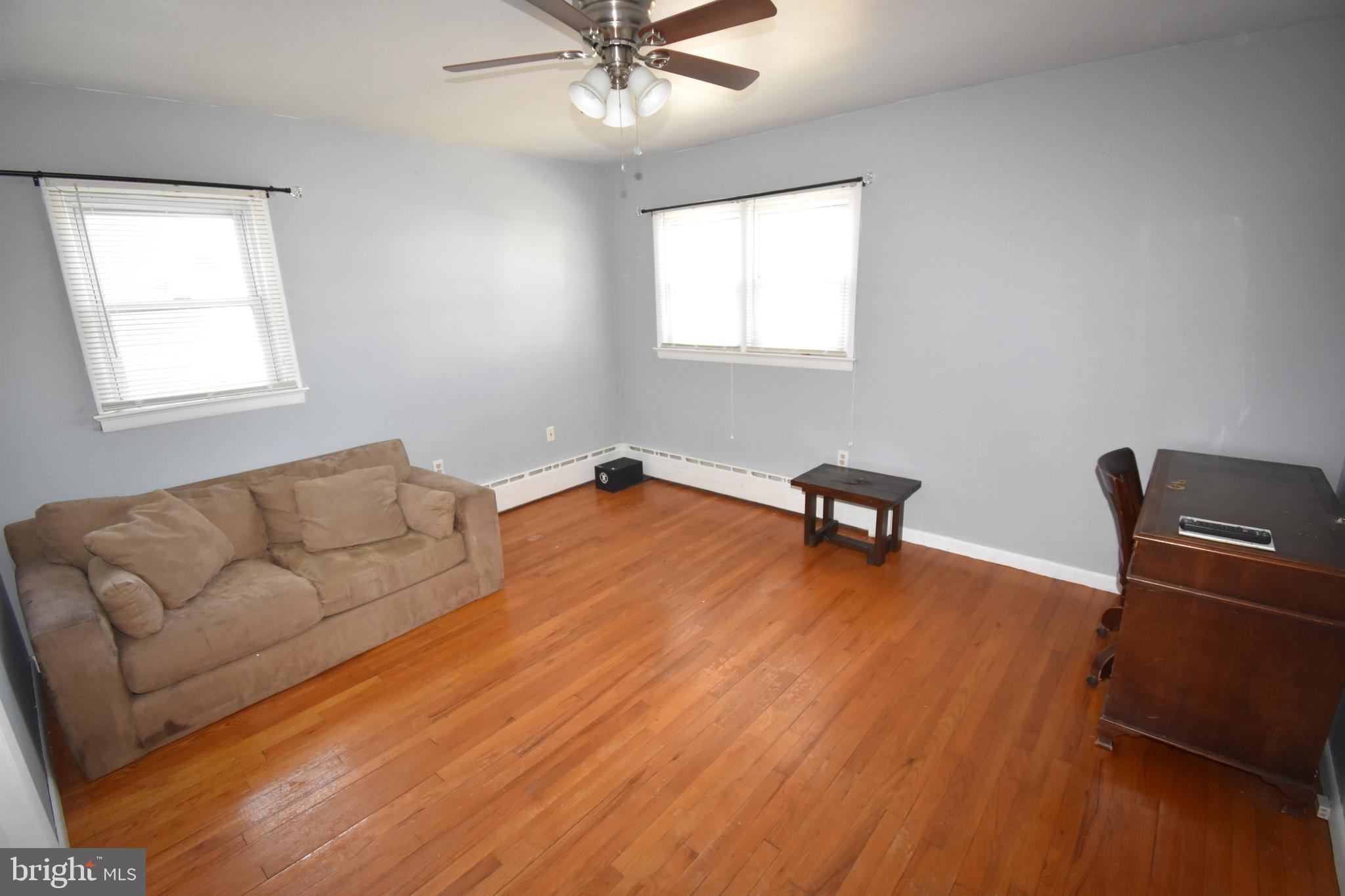165 West Federal Street Burlington, NJ 08016 - Photo 18 of 27 a living room with furniture and a window