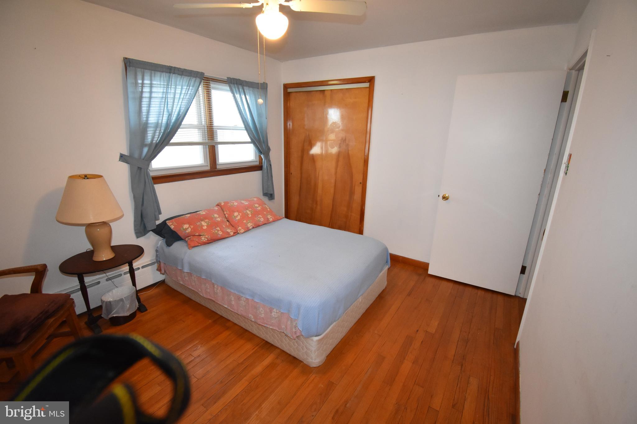 165 West Federal Street Burlington, NJ 08016 - Photo 20 of 27 a bedroom with a bed and a window
