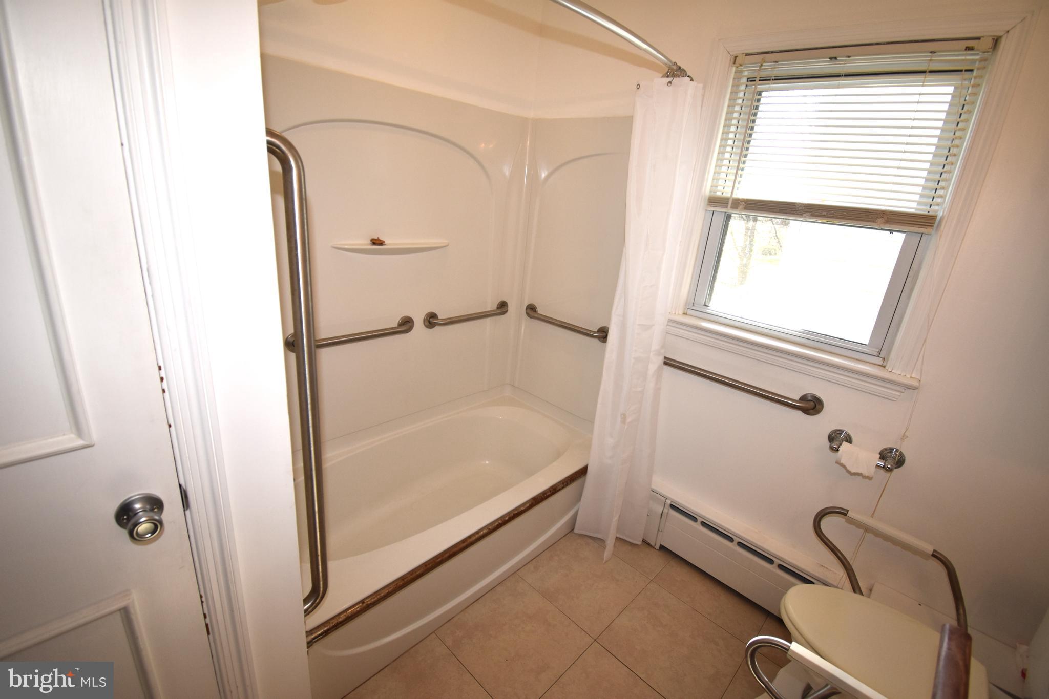 165 West Federal Street Burlington, NJ 08016 - Photo 24 of 27 a bathroom with a bathtub and shower