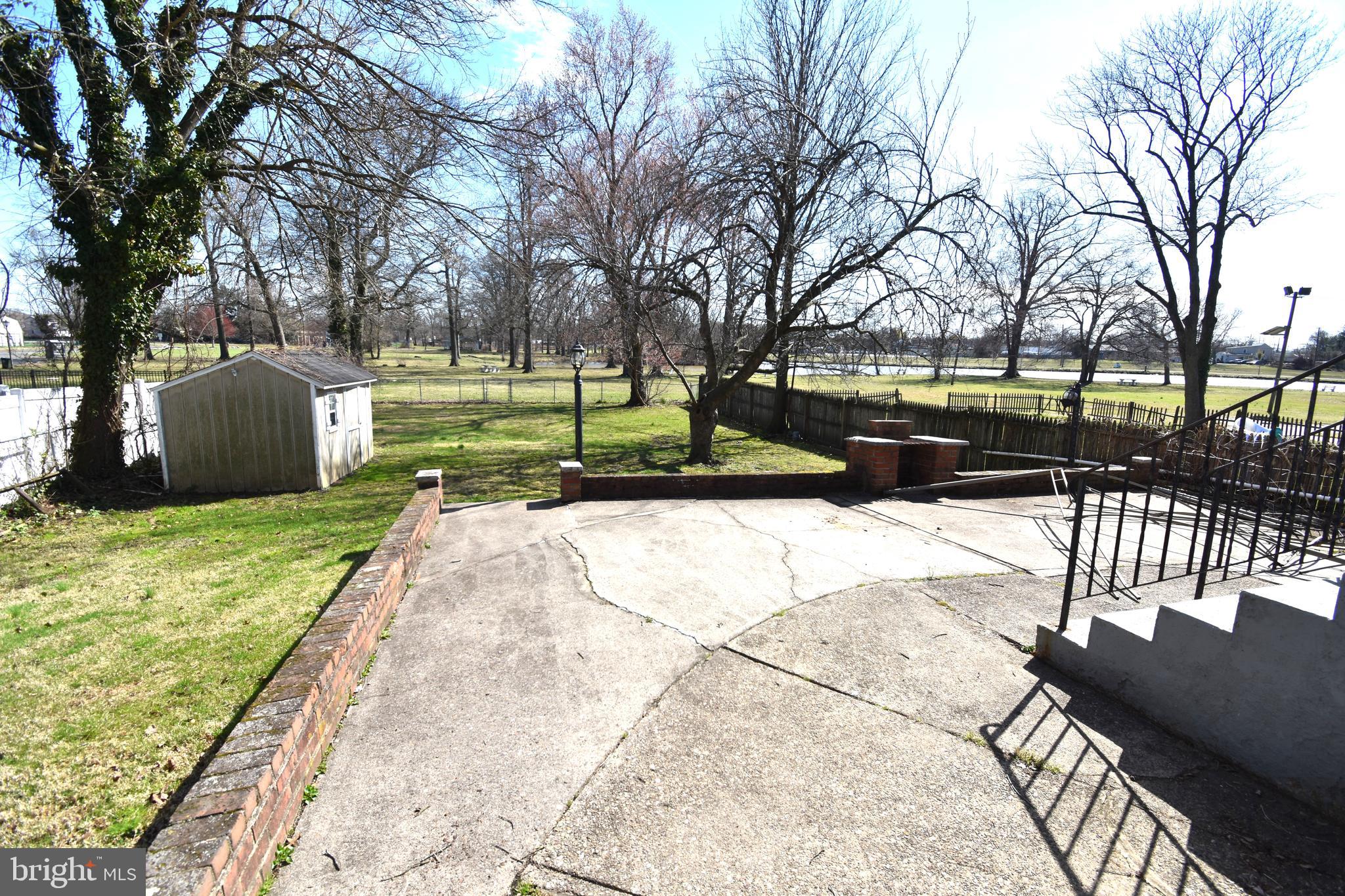 165 West Federal Street Burlington, NJ 08016 - Photo 4 of 27 a view of a park with large trees