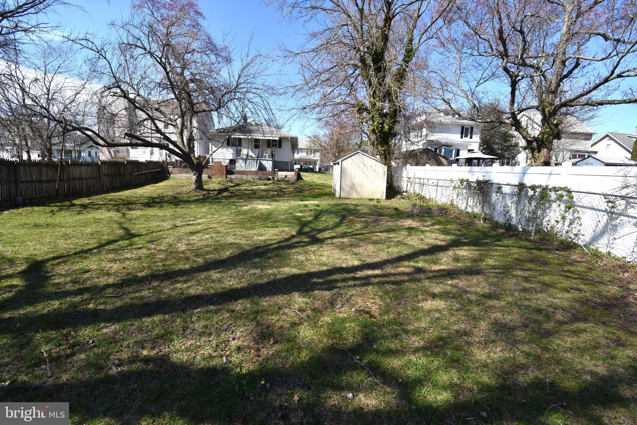 165 West Federal Street Burlington, NJ 08016 - Photo 7 of 27 a view of yard with tree