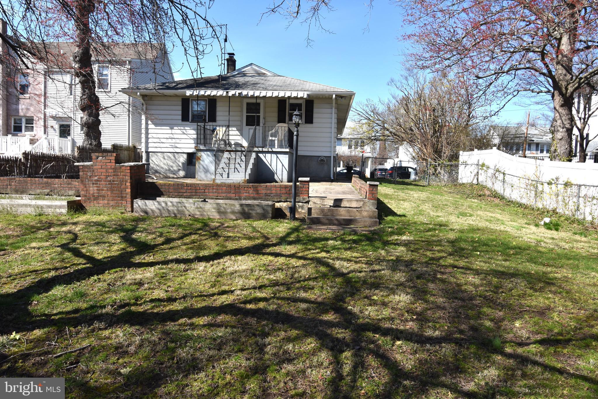 165 West Federal Street Burlington, NJ 08016 - Photo 8 of 27 a view of a house with a yard