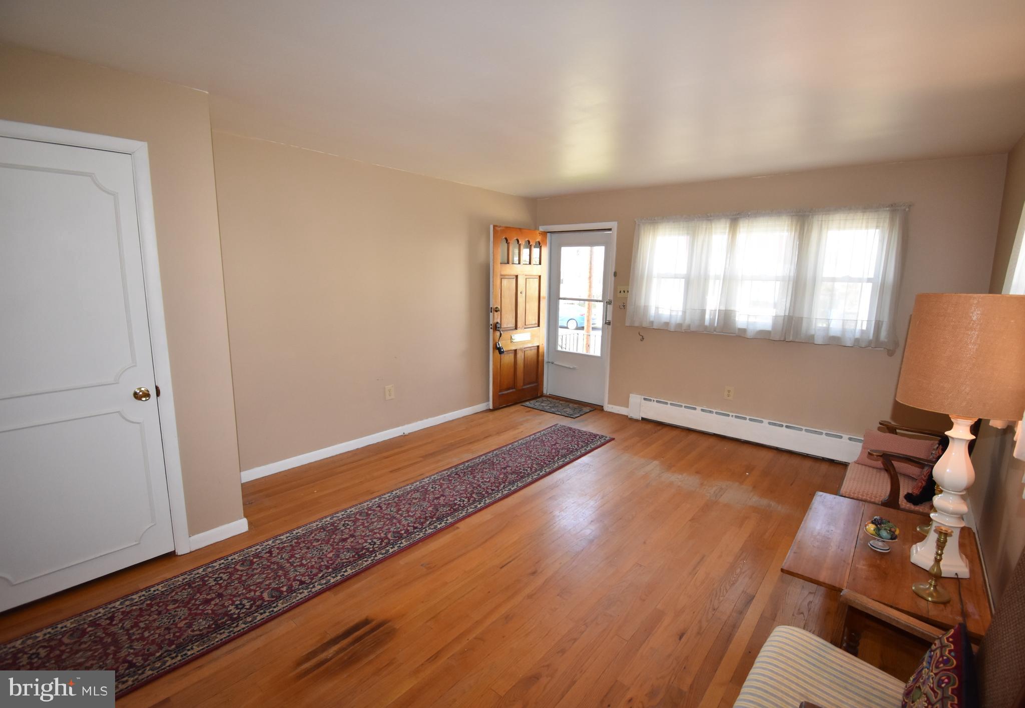 165 West Federal Street Burlington, NJ 08016 - Photo 10 of 27 a view of room with window and wooden floor