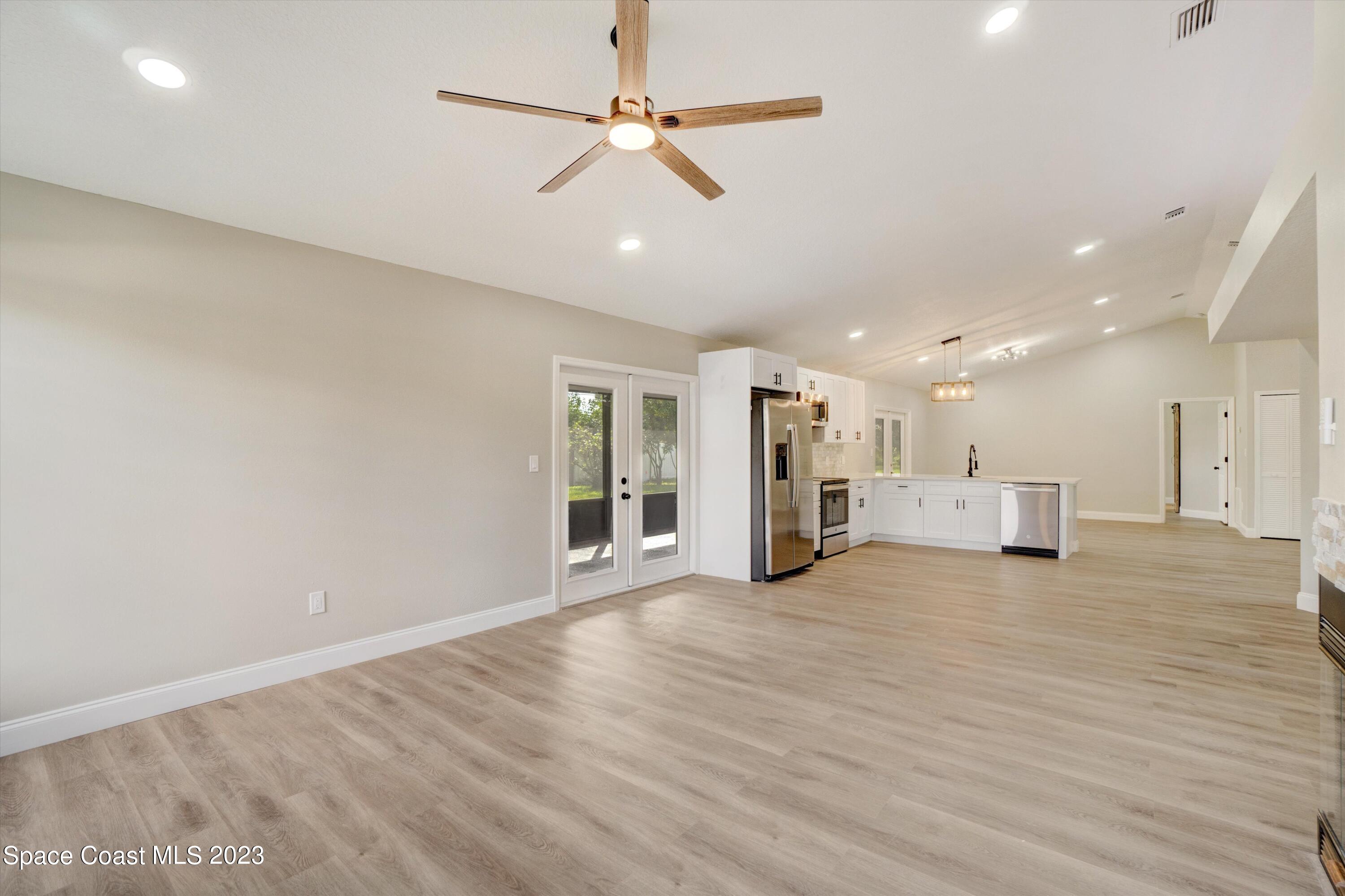 207 Eldron Boulevard Southeast Palm Bay, FL 32909 - Photo 21 of 60 a view of an empty room with a window