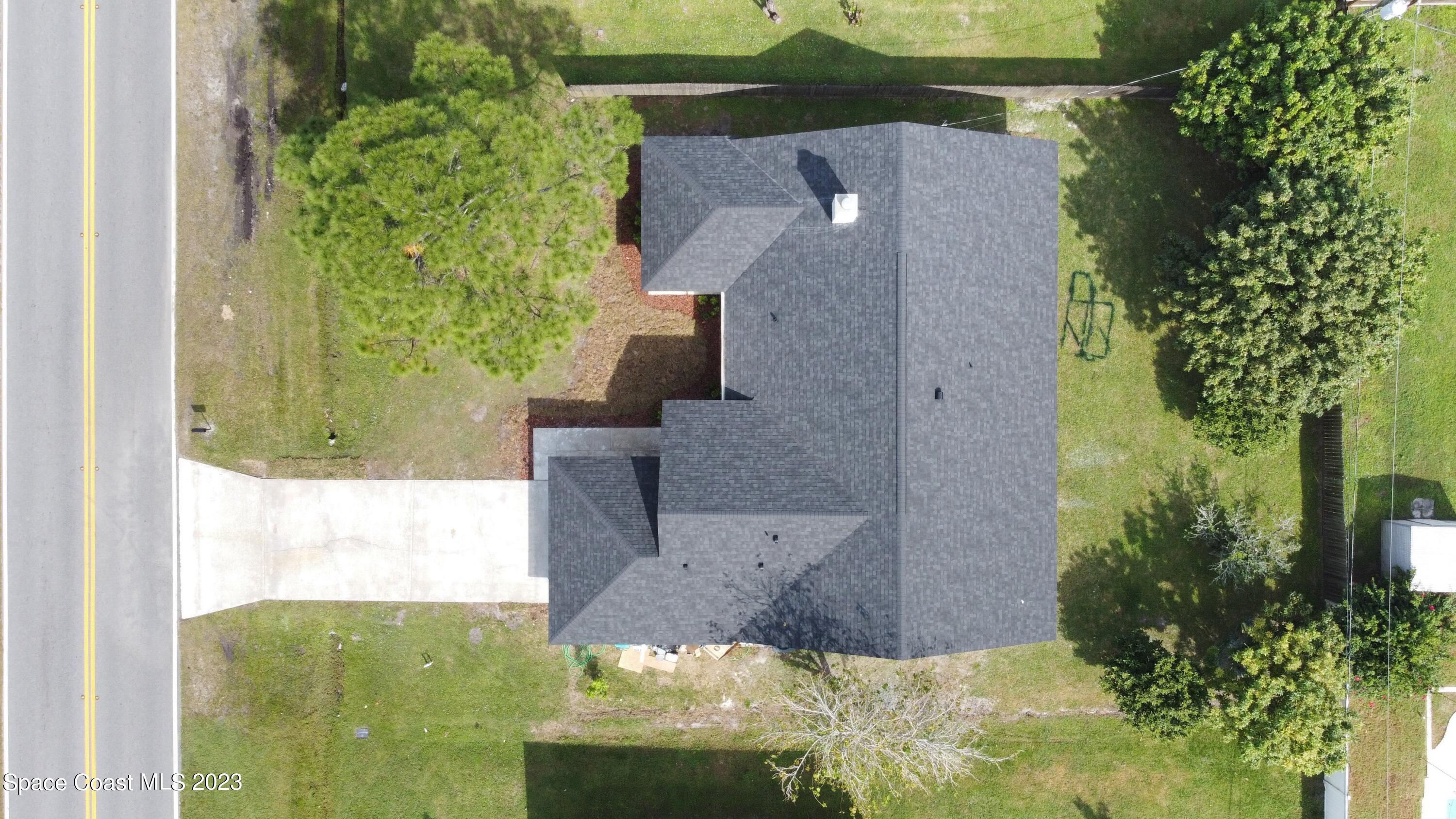 207 Eldron Boulevard Southeast Palm Bay, FL 32909 - Photo 52 of 60 an aerial view of a house