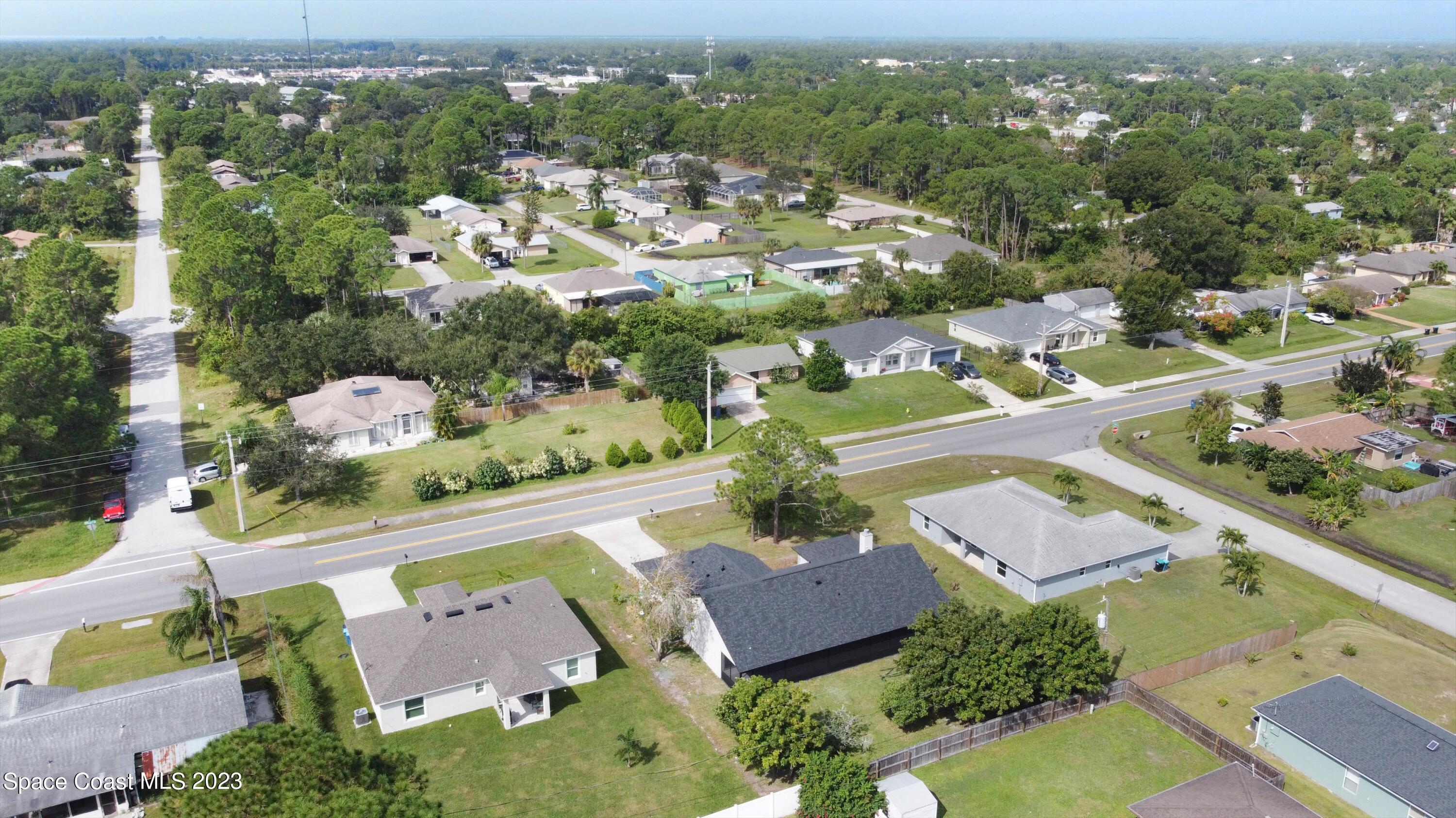 207 Eldron Boulevard Southeast Palm Bay, FL 32909 - Photo 59 of 60 an aerial view of residential house with outdoor space