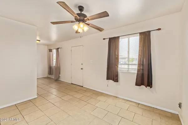 a view of an empty room and window