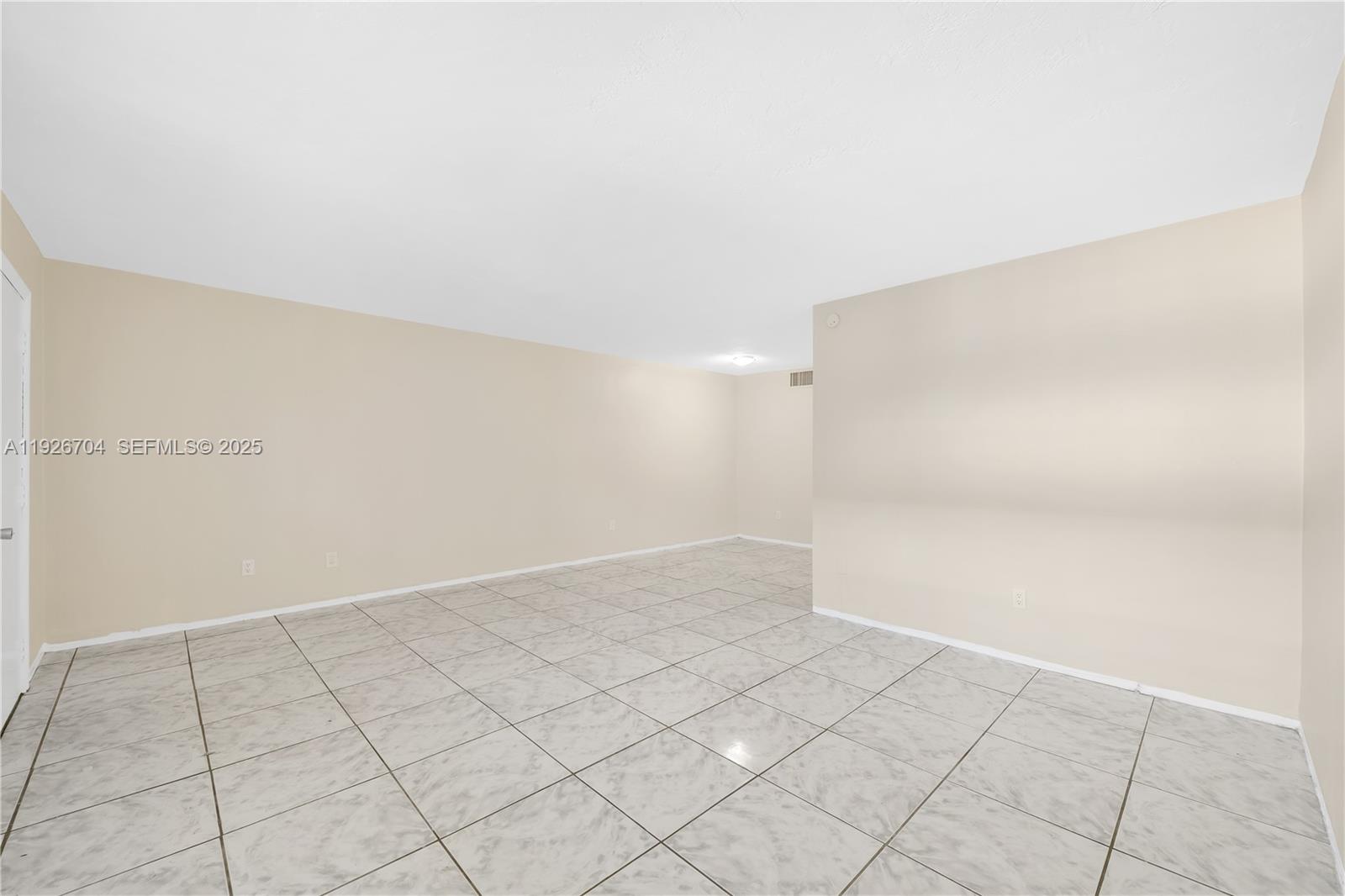 16215 Northeast 18th Court, Unit 212 North Miami Beach, FL 33162 - Photo 3 of 16 a view of an empty room