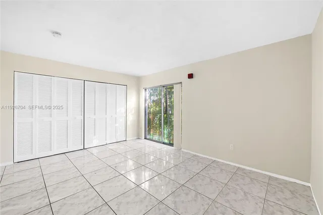 a view of an empty room with window