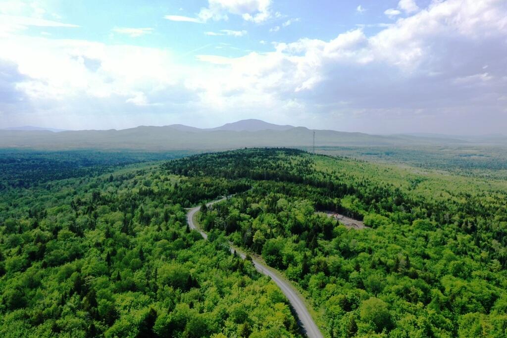 Tbd Tbd Alpine Ridge, Unit LOT 10 Greenville, ME 04441 - Photo 2 of 14 DJI_0216