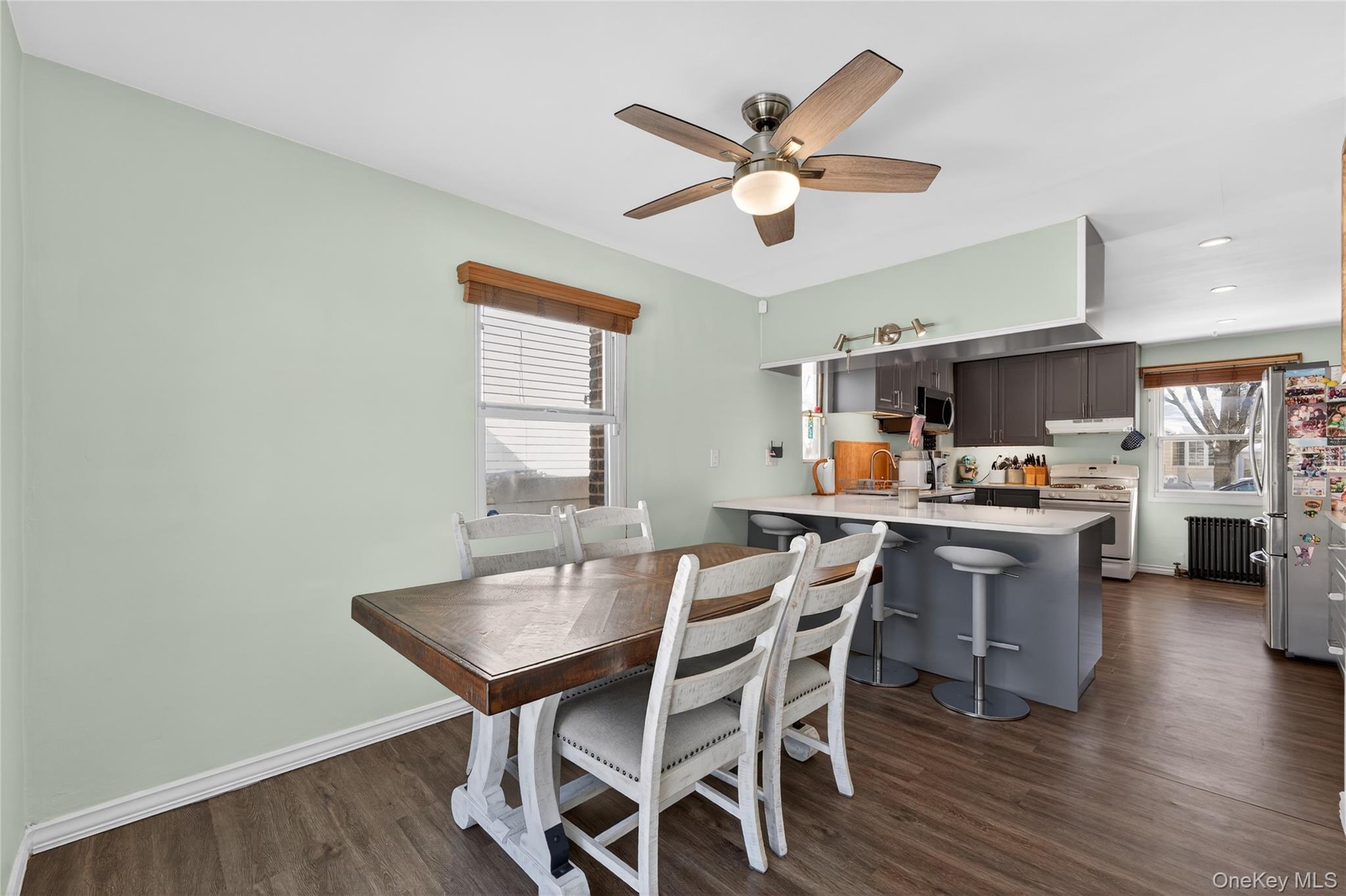 49-54 166th Street Queens, NY 11365 - Photo 19 of 41 a view of a dining room with furniture window and wooden floor